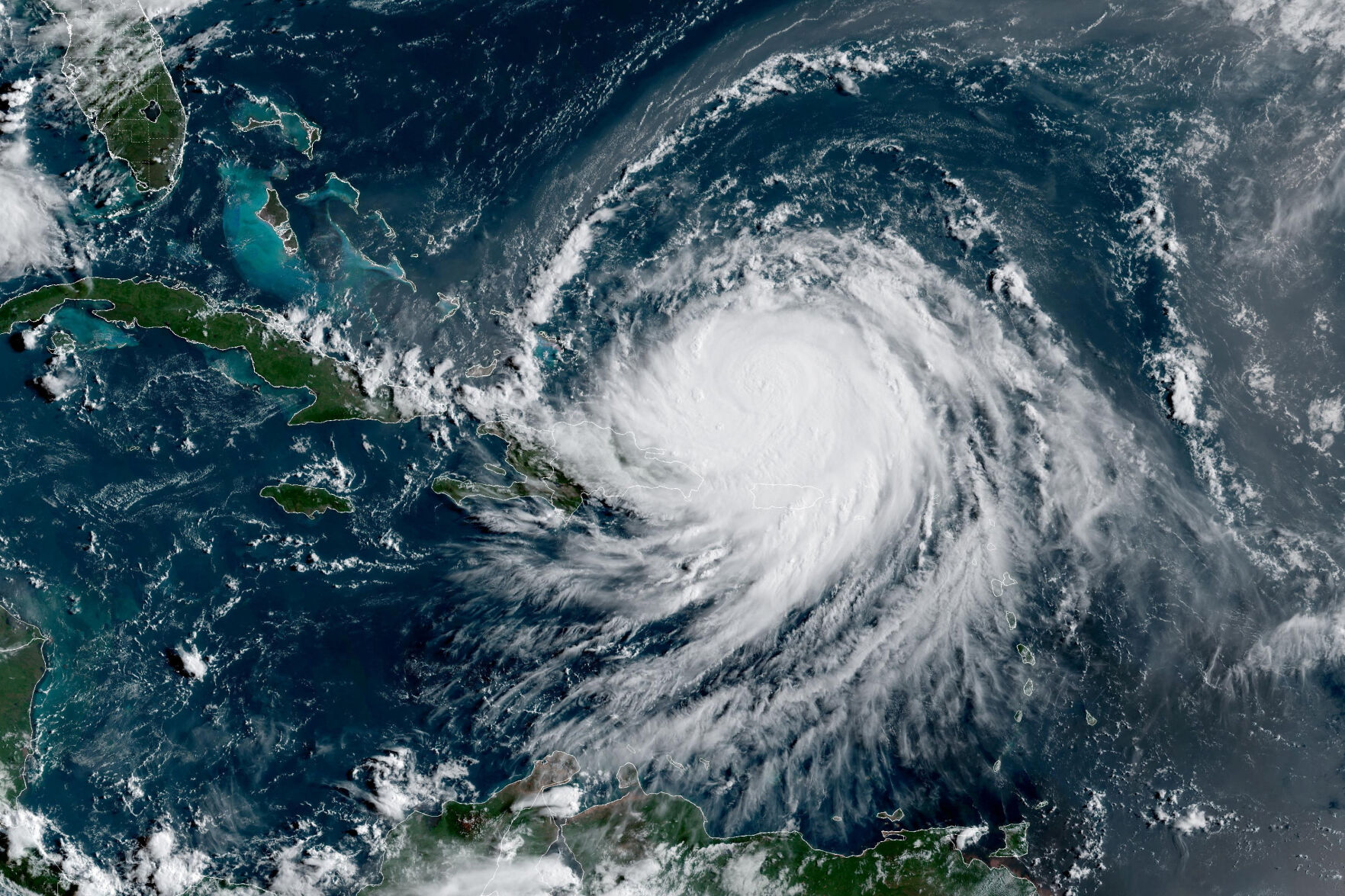 Hurricane Erin forces evacuations on North Carolina's Outer Banks but it's expected to stay offshore